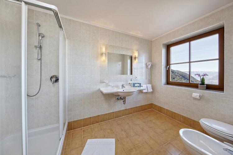 Bathroom with window and a shower